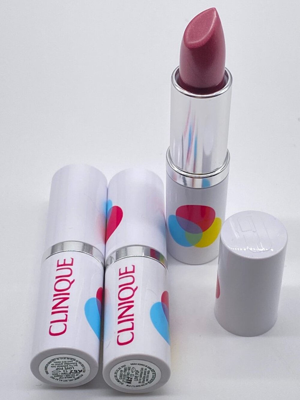 3 Clinique Pop Lip Colour + Primer Lipsticks in the shade 13 Love Pop